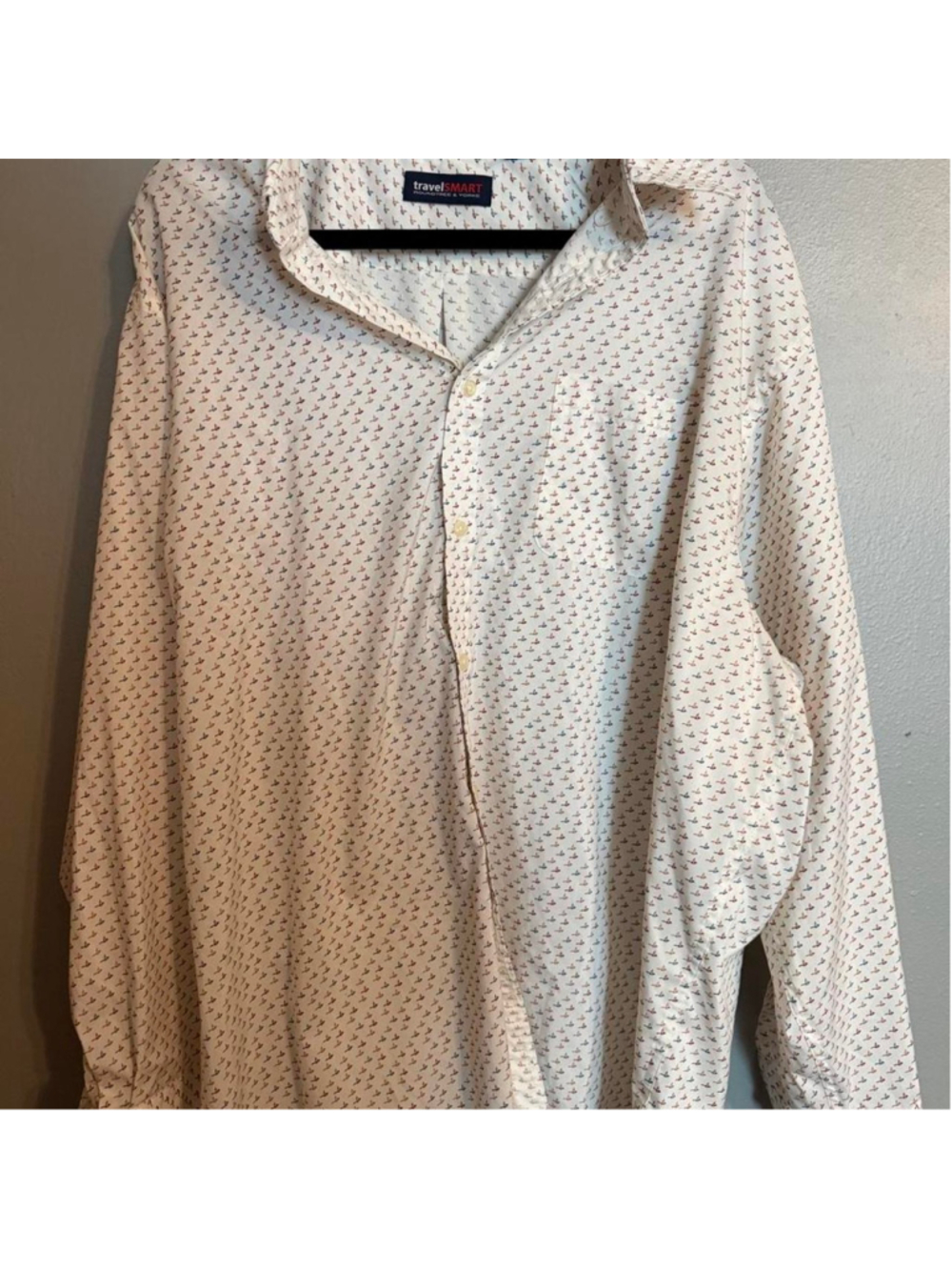 Cream micro bird print button-up shirt with an allover red, navy and tan flying